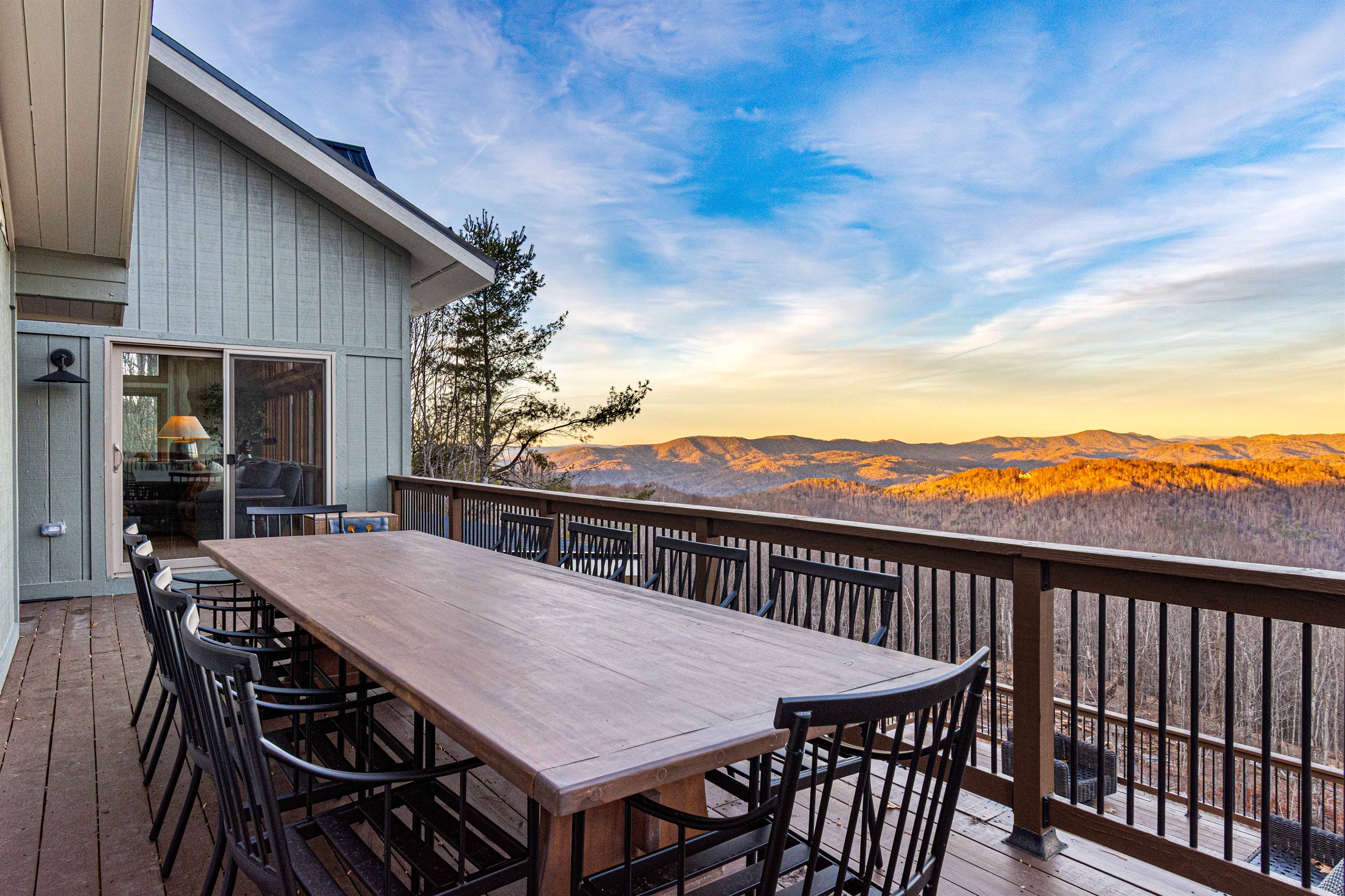 Off of both living rooms is an expansive deck with outdoor dining—perfect for long meals and golden hour views.