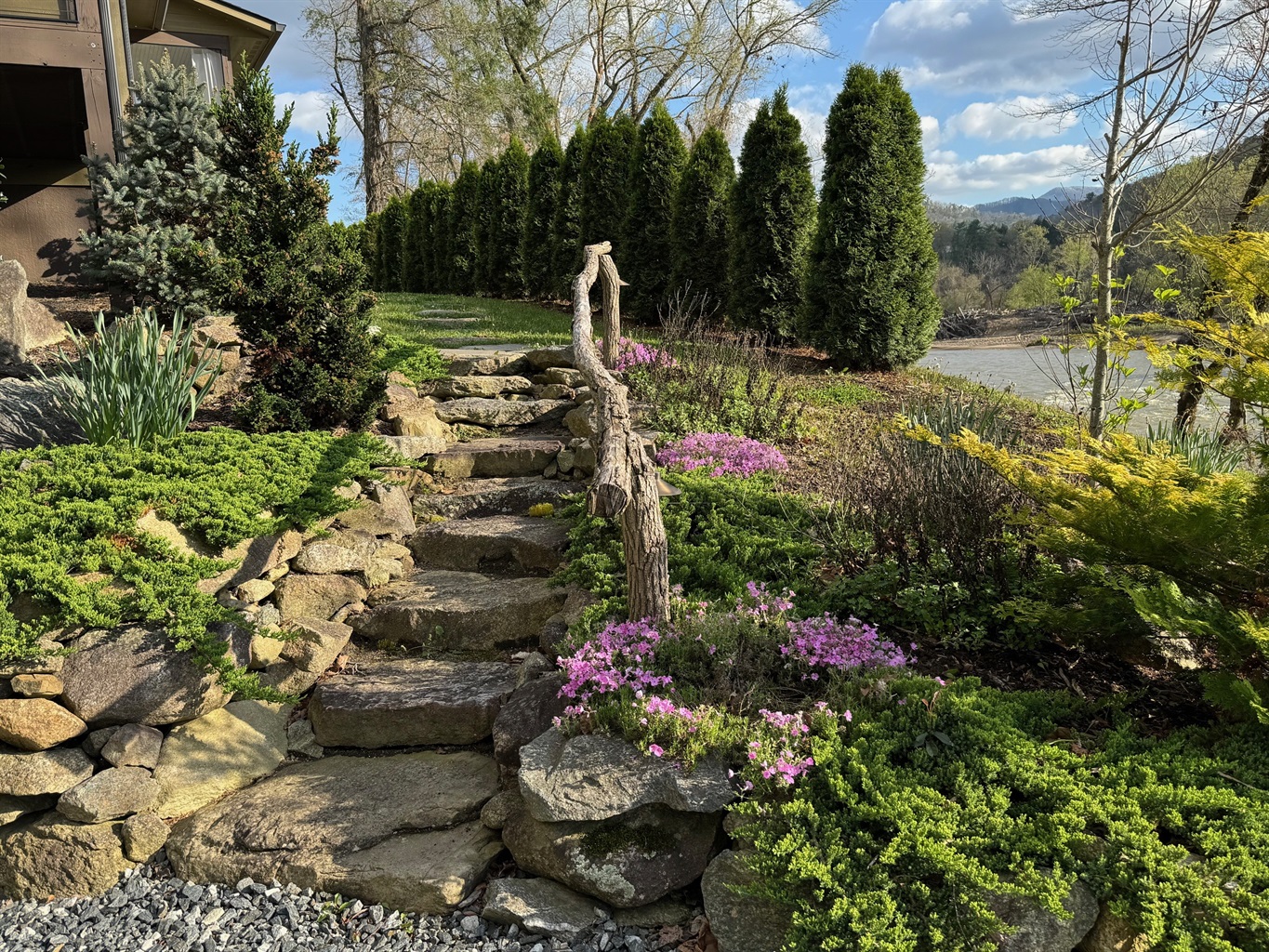 Stone steps from the parking area that lead to the main entrance