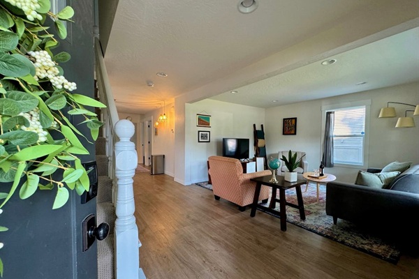 Imagine curling up in this cozy living room for a movie night or perhaps a family game night. We offer board games for our guests to enjoy during their stay with us! 
