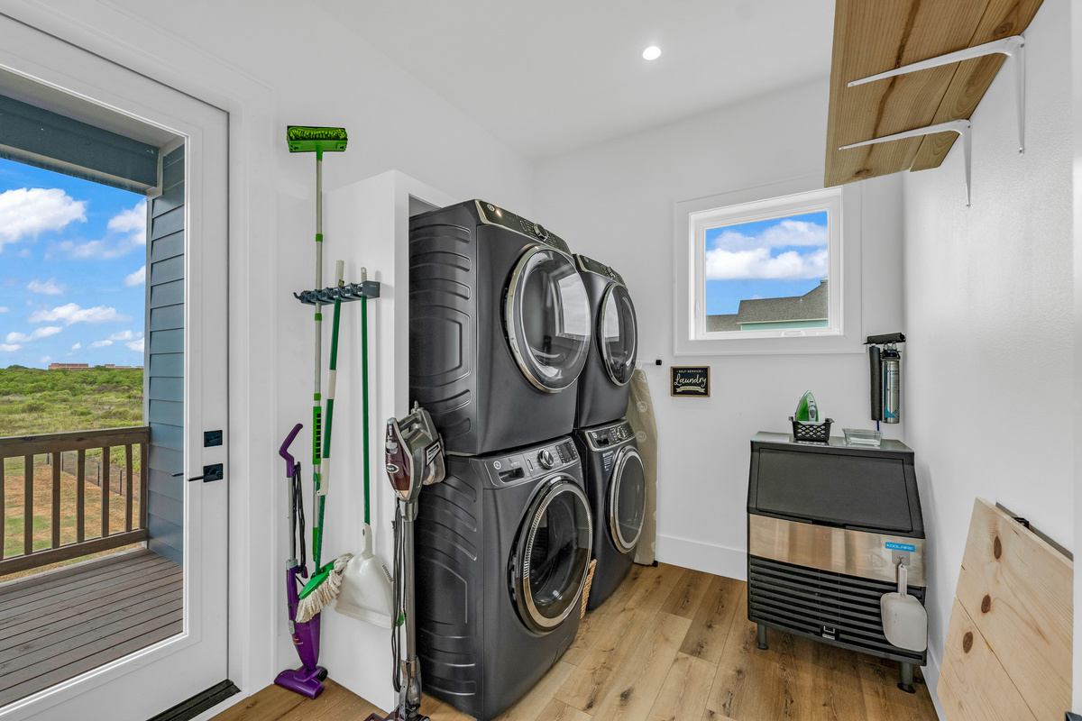 Cair Paravel: Two stacked washer/dryer sets and a commercial ice maker make laundry day (and beach-day refreshments) effortless for a full house.
