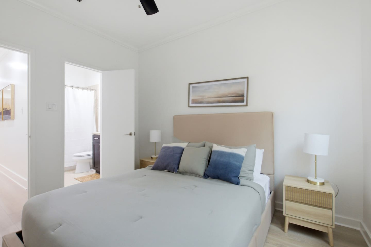 Queen bedroom walk-in closet with open shelving throughout. Plenty of storage space to organize and unpack for the duration of your stay without living out of a suitcase.

