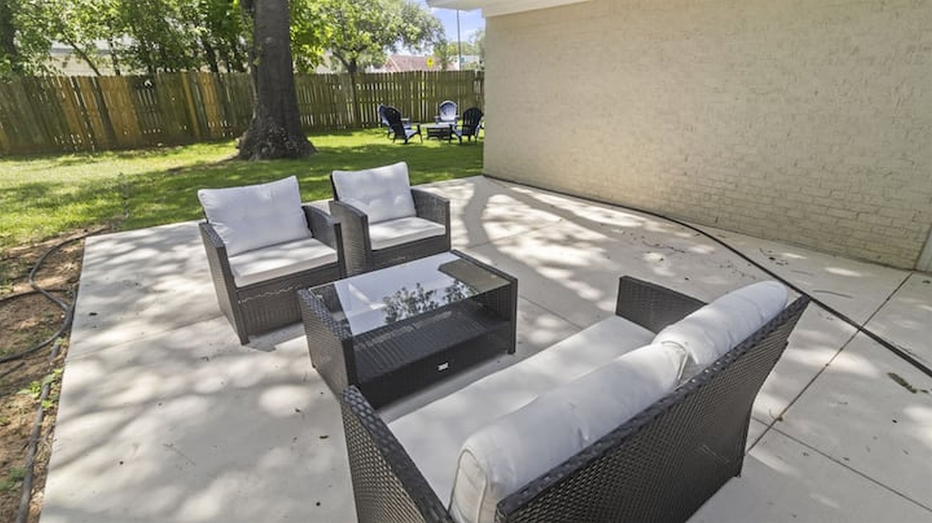 Private outdoor patio with comfortable seating and plenty of space to unwind outdoors.