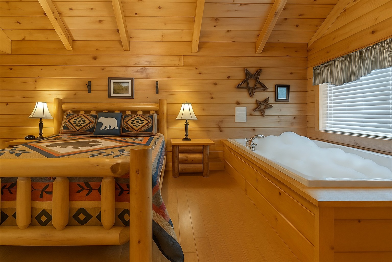 Master en-suite bedroom with attached bathroom and jacuzzi tub. Romanticly romantic