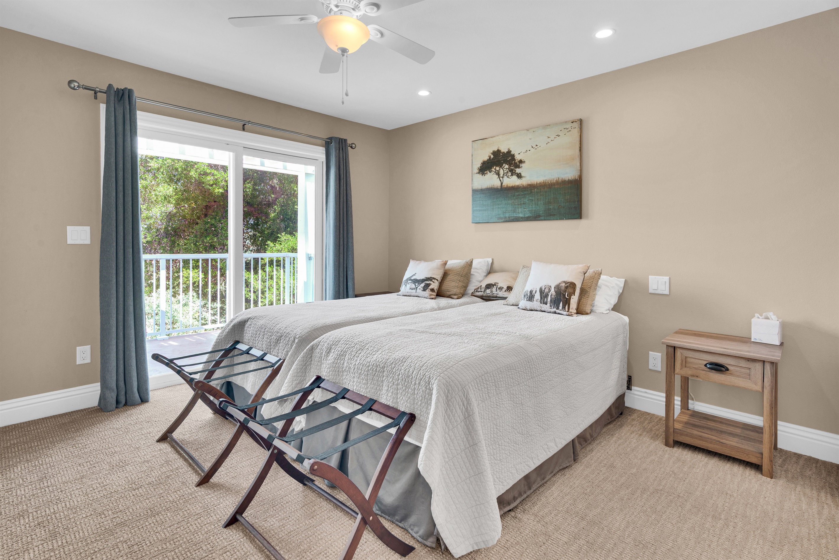 3rd bedroom with two twins that are configured together. Also with a balcony.