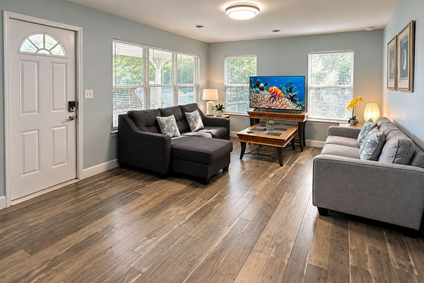 Living Room Retreat: Bright and airy space with modern decor, perfect for relaxation and fun!