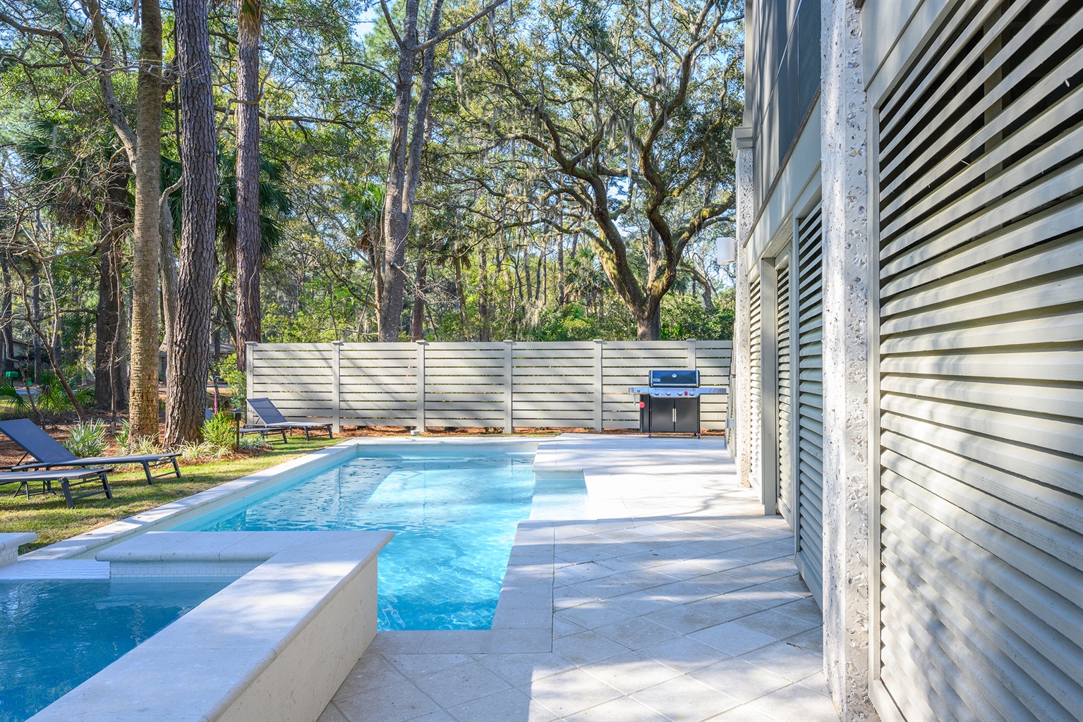 Pool features in pool bench for relaxing with an adult beverage