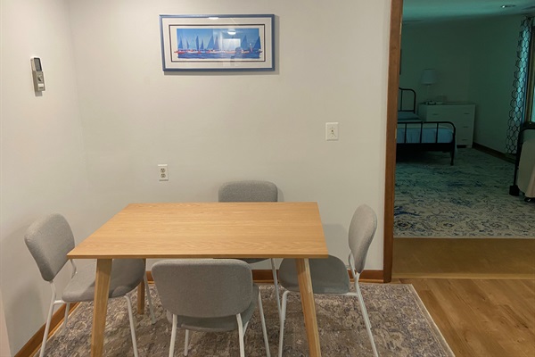 Dining area seats four comfortably.