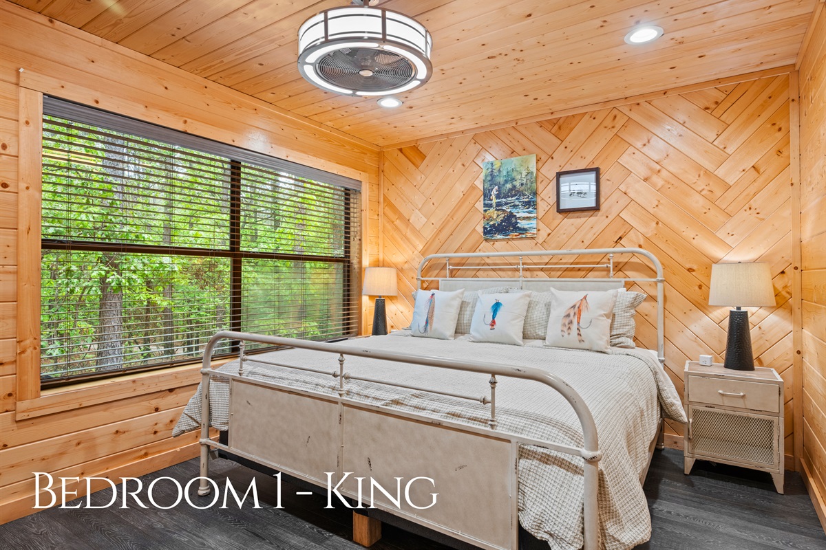 This king bedroom offers a calm and comfortable place to unwind, with soft lighting and a peaceful atmosphere.