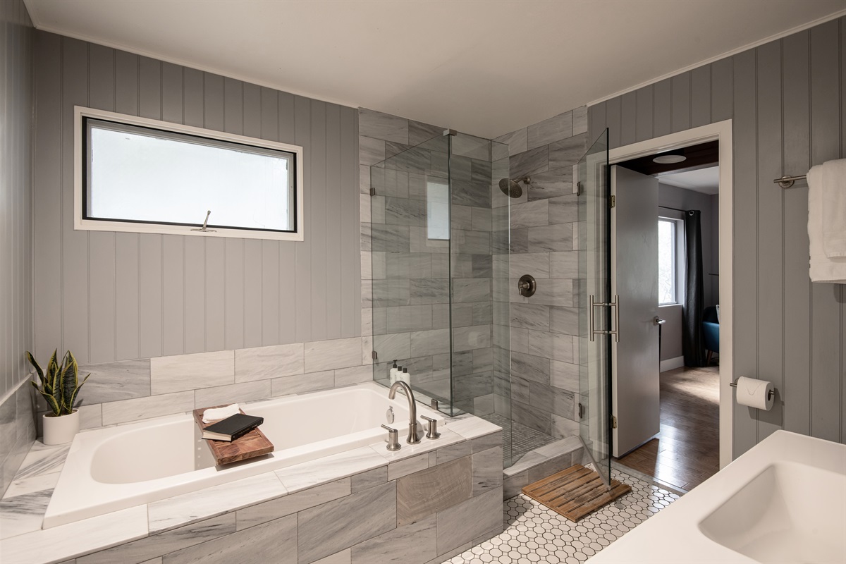 Spacious bathroom with soaking tub and walk-in shower—perfect for relaxing after a day exploring Lake Arrowhead.