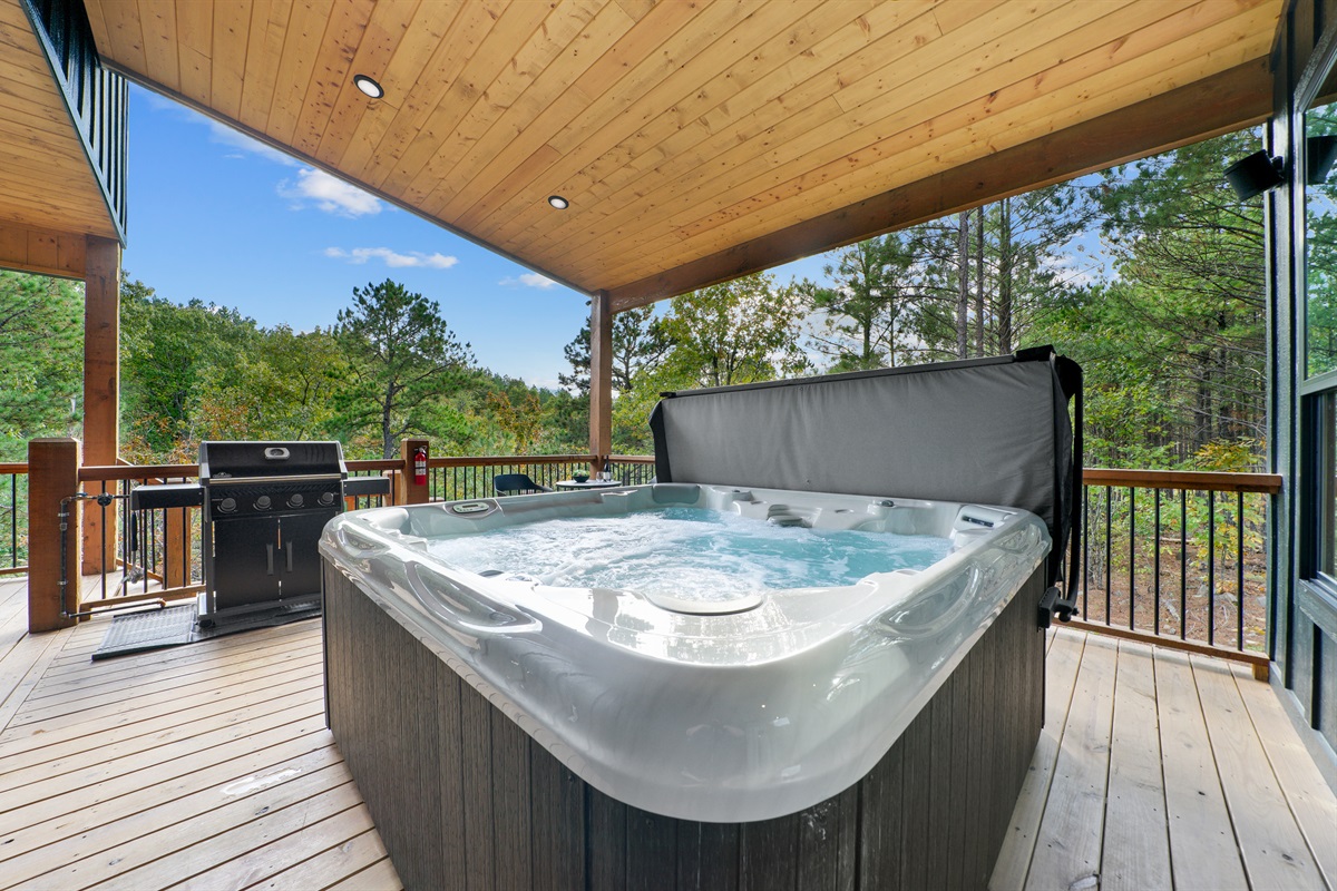 After a day of exploring, enjoy a relaxing soak in the hot tub while overlooking the gorgeous surrounding topography.