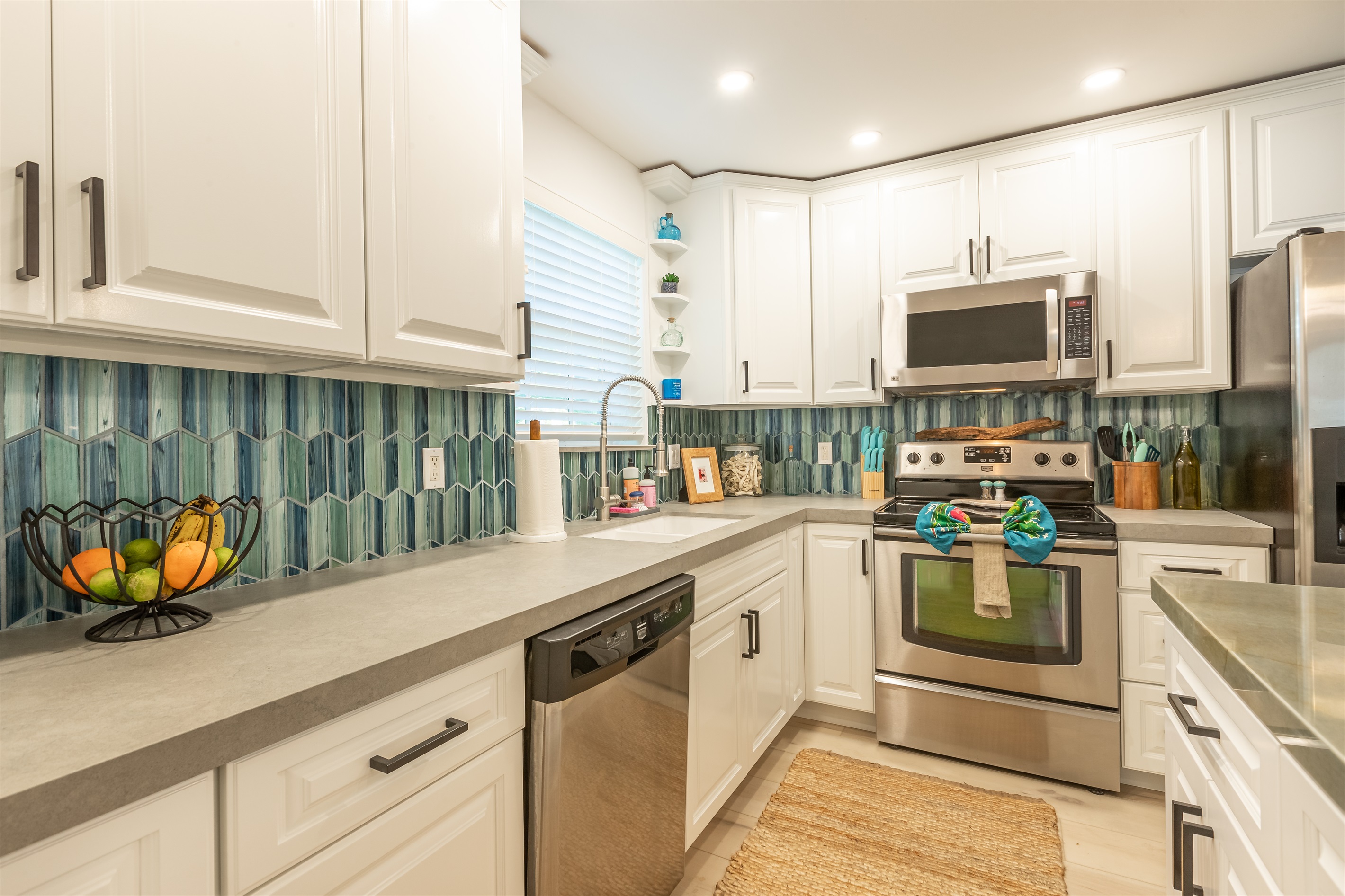 Kitchen Oasis: Bright, airy space with vibrant tiles, modern appliances, and a cheerful vibe!