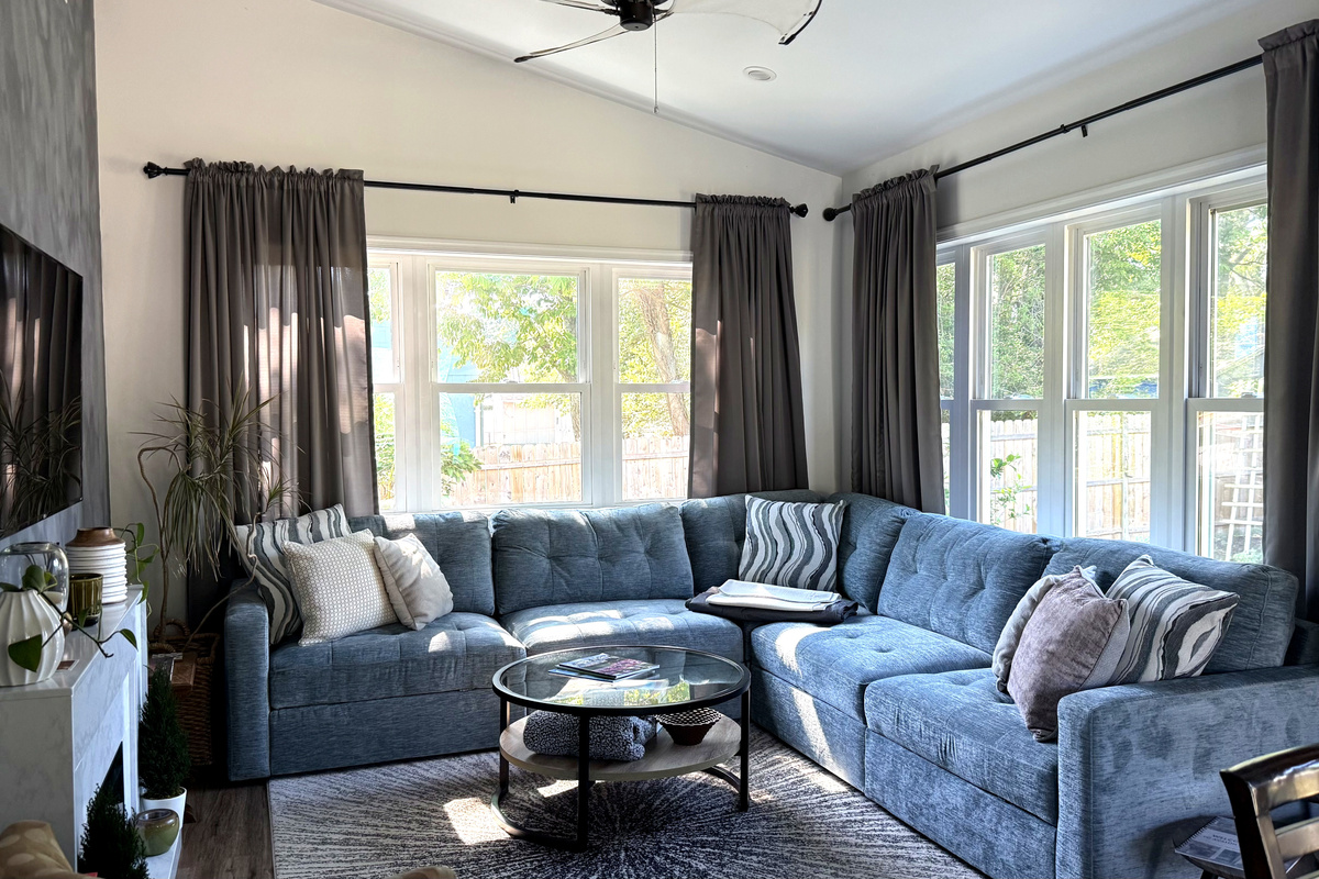 big comfy sectional with fireplace and tv for movie nights
