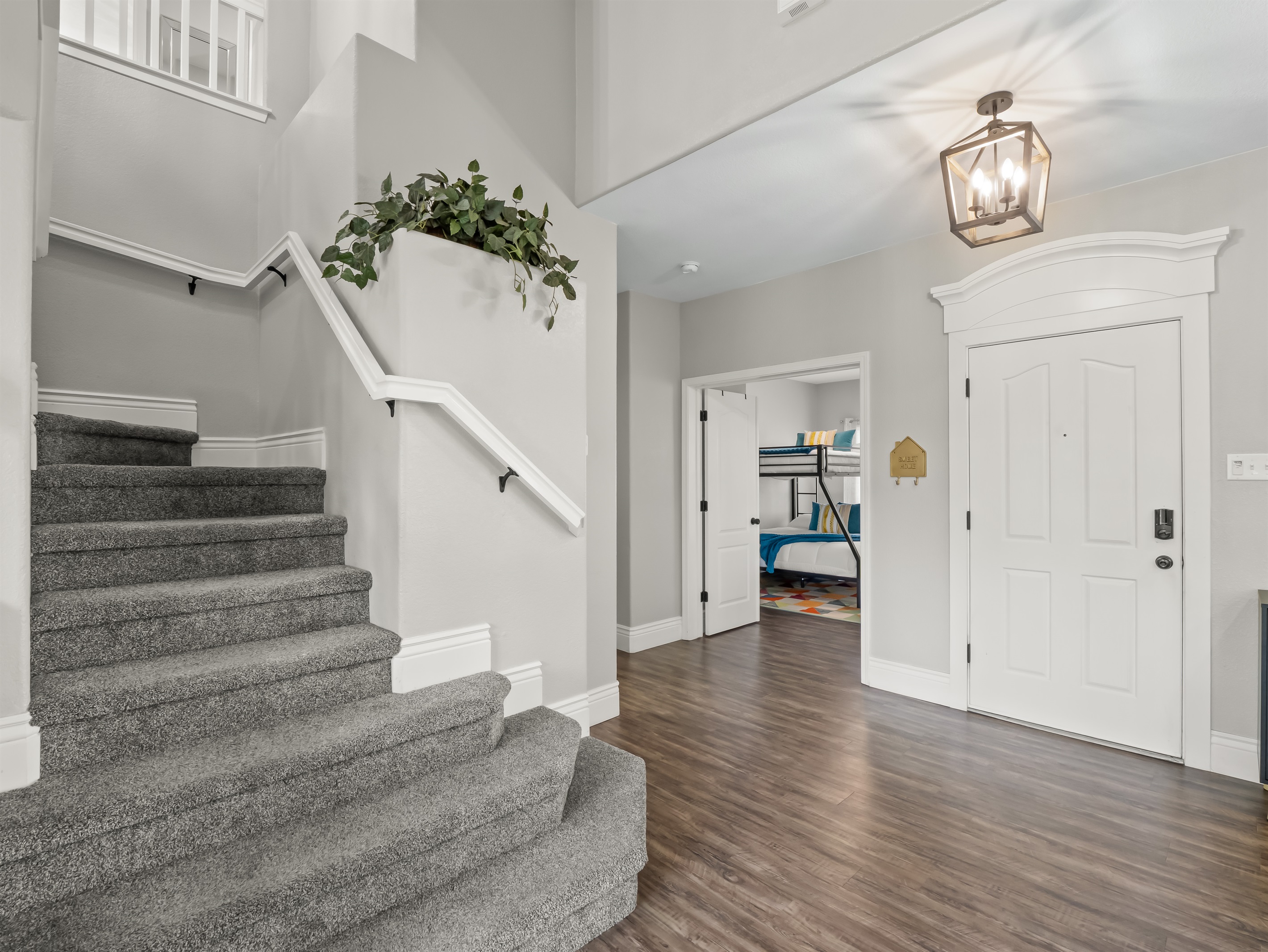 Bright, open entry with easy access to a downstairs bedroom—perfect for multi-generational stays or families needing flexible sleeping arrangements.