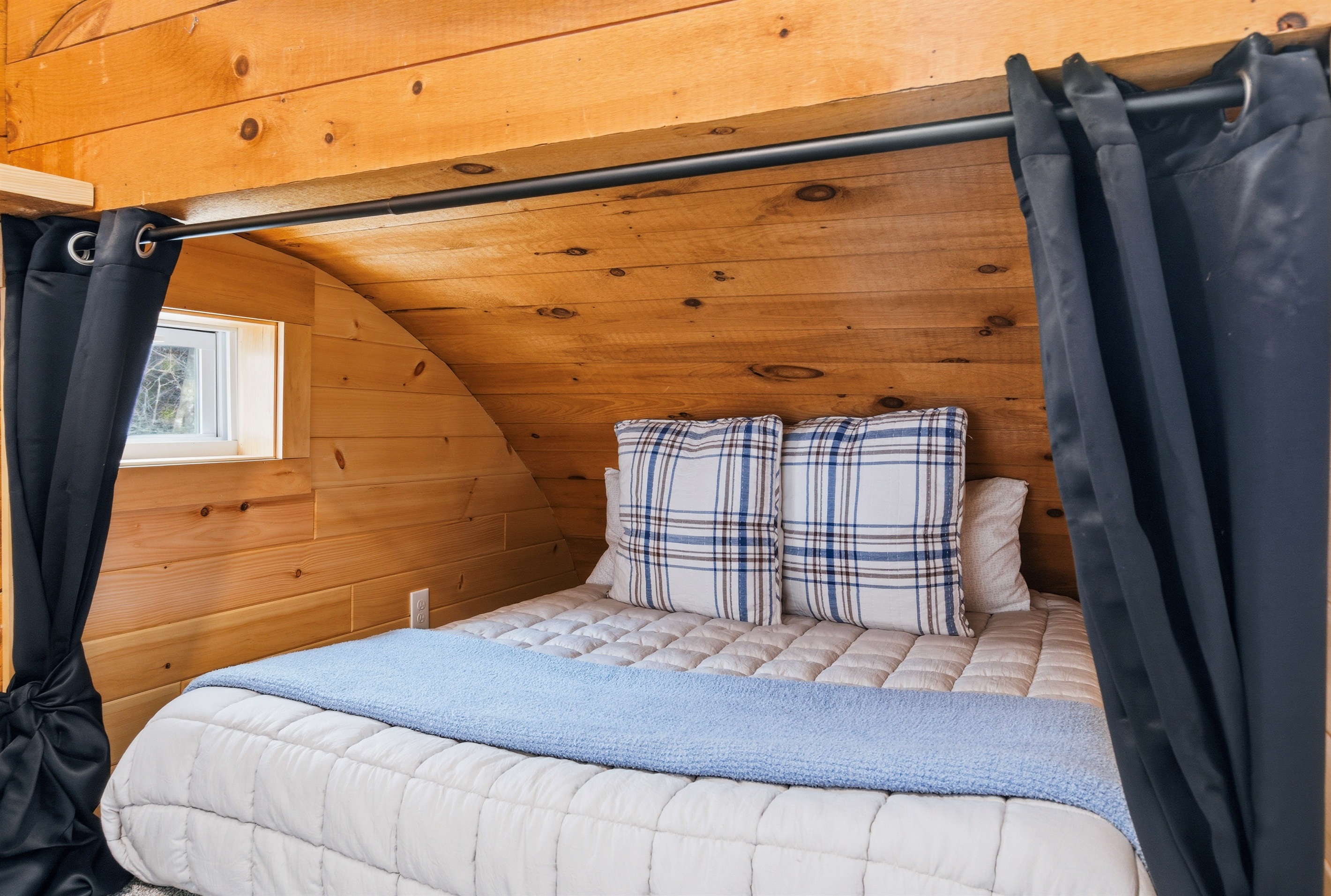 Discover our cozy 'secret' sleeping nook, the ultimate snug retreat for a peaceful night’s rest under the stars.