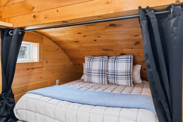 Discover our cozy 'secret' sleeping nook, the ultimate snug retreat for a peaceful night’s rest under the stars.