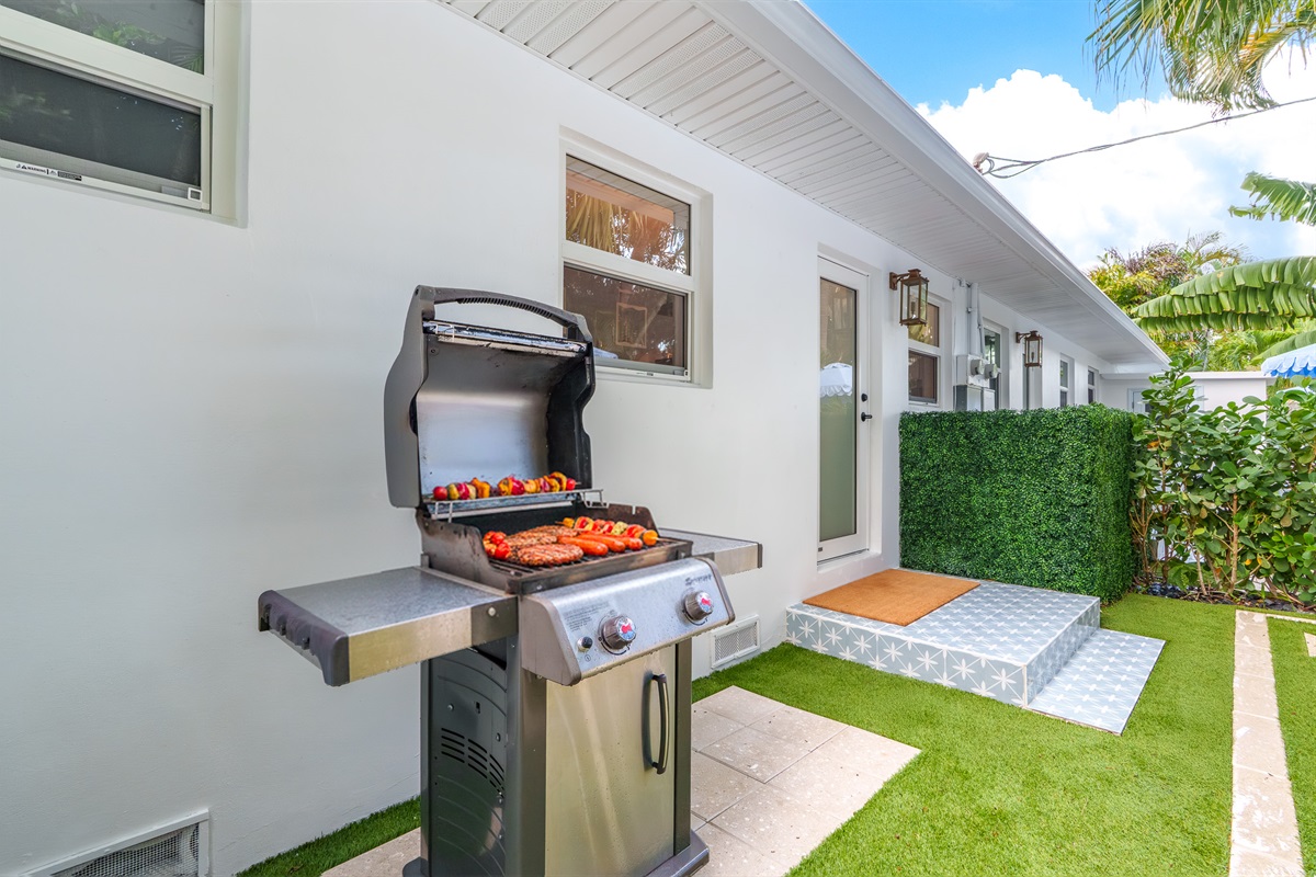 Seamless indoor-outdoor flow makes it easy to transition from the kitchen to the patio.