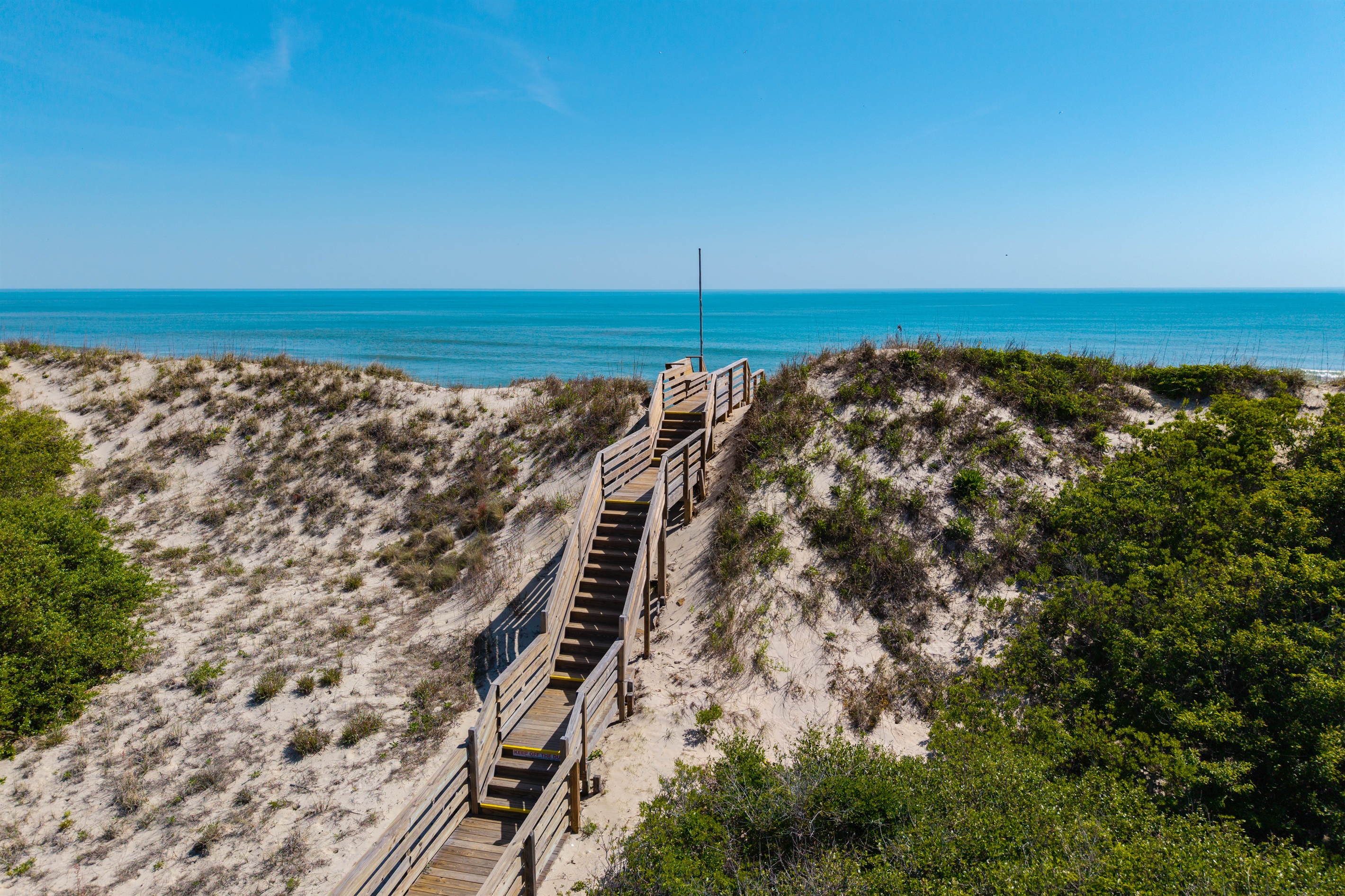 Easy walk over the dunes puts you right on the beach in just moments.