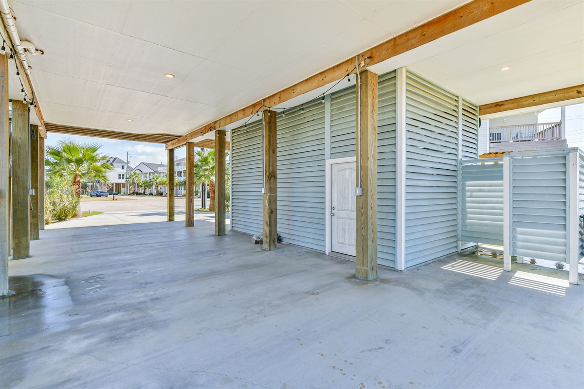 Carport parking with an outdoor shower