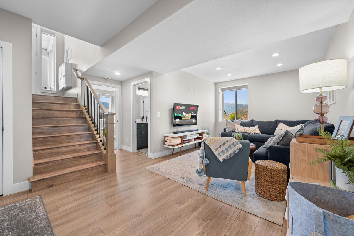 Spacious lower-level entertainment area with easy access to the bedrooms, creating the perfect retreat for families and larger groups.