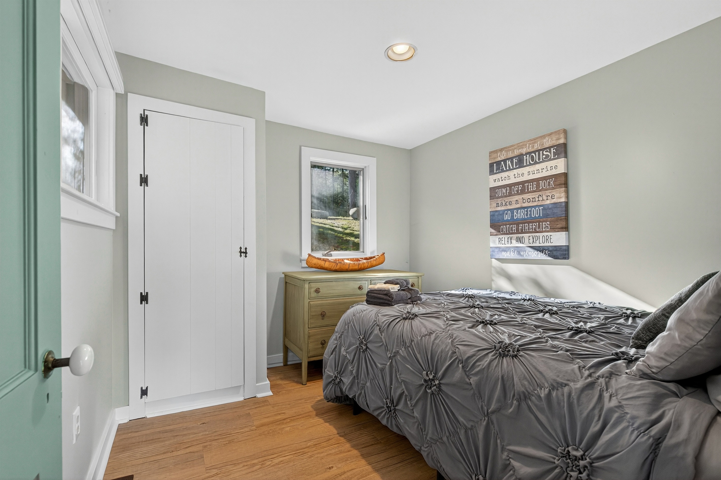 1st Fl bedroom #1 features a double bed.