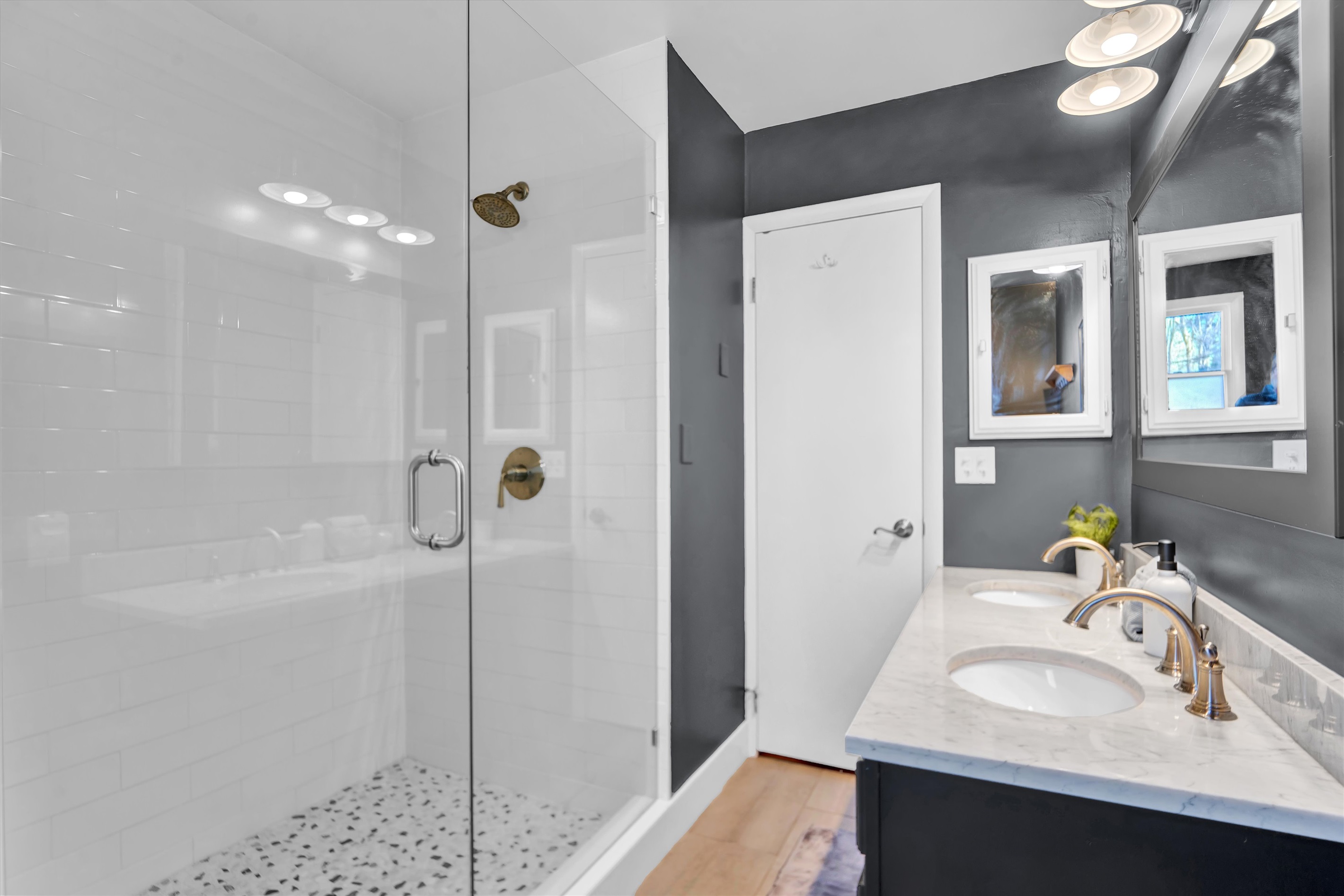 Bright, modern ensuite bathroom.