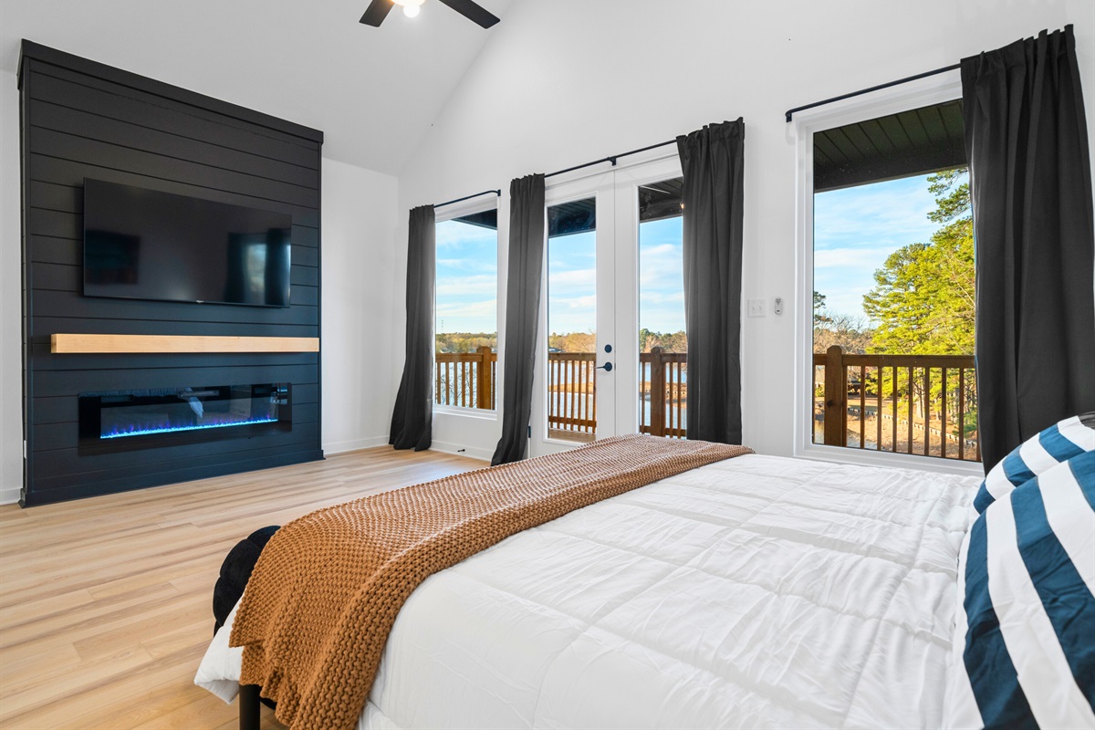 Large windows bring in natural light and soft views of the outdoors.