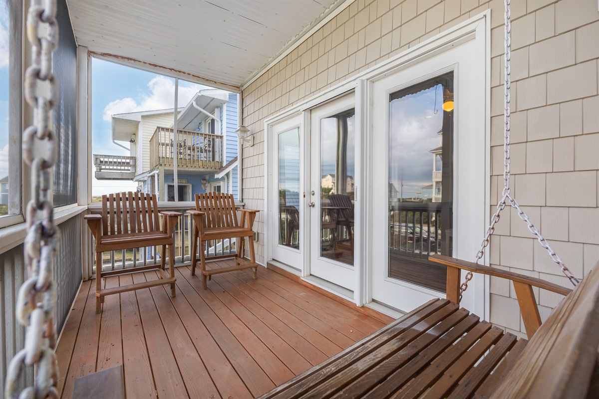 Shaded deck with views of the ocean and waterway