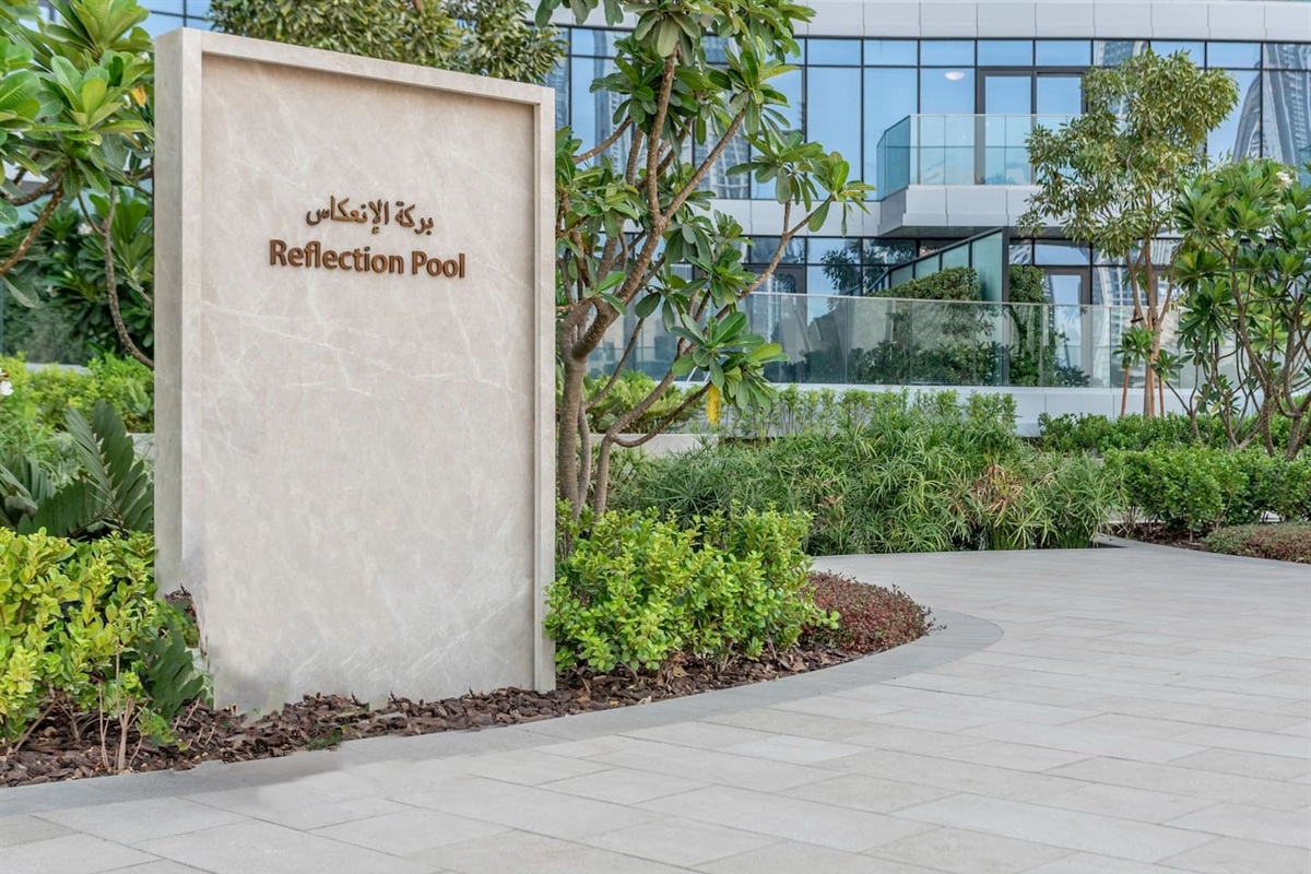 This residence features a tranquil water garden with lush greenery, offering a serene escape unlike other buildings in the area. A unique touch of nature blended with modern living, creating an exclusive and refreshing atmosphere for guests.