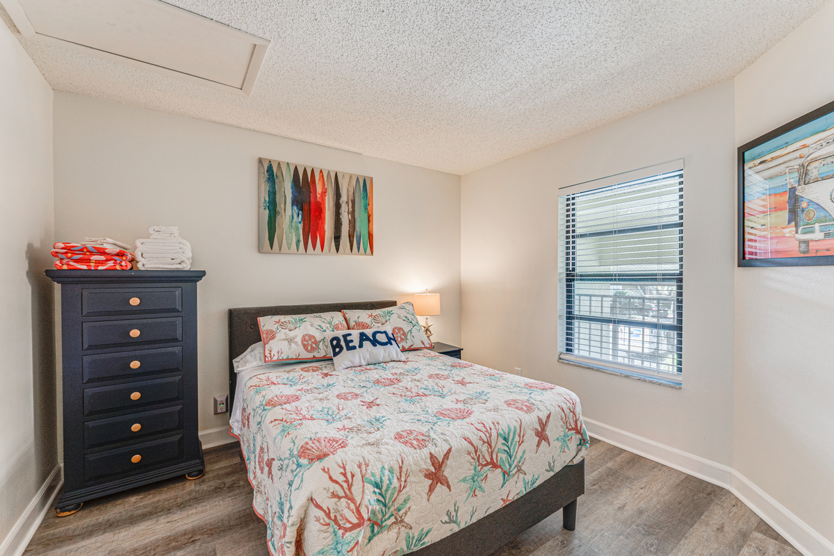 Conveniently located for guests, the second full bathroom features a bathtub, fresh towels, and everything needed to get ready for the day.

