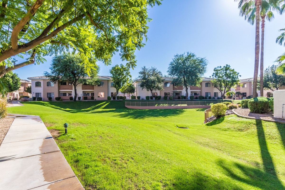 Lots of green grass on the grounds.