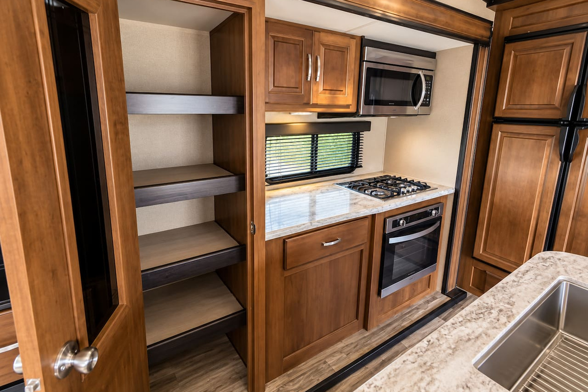Generously sized pantry, gas stove and oven, microwave.