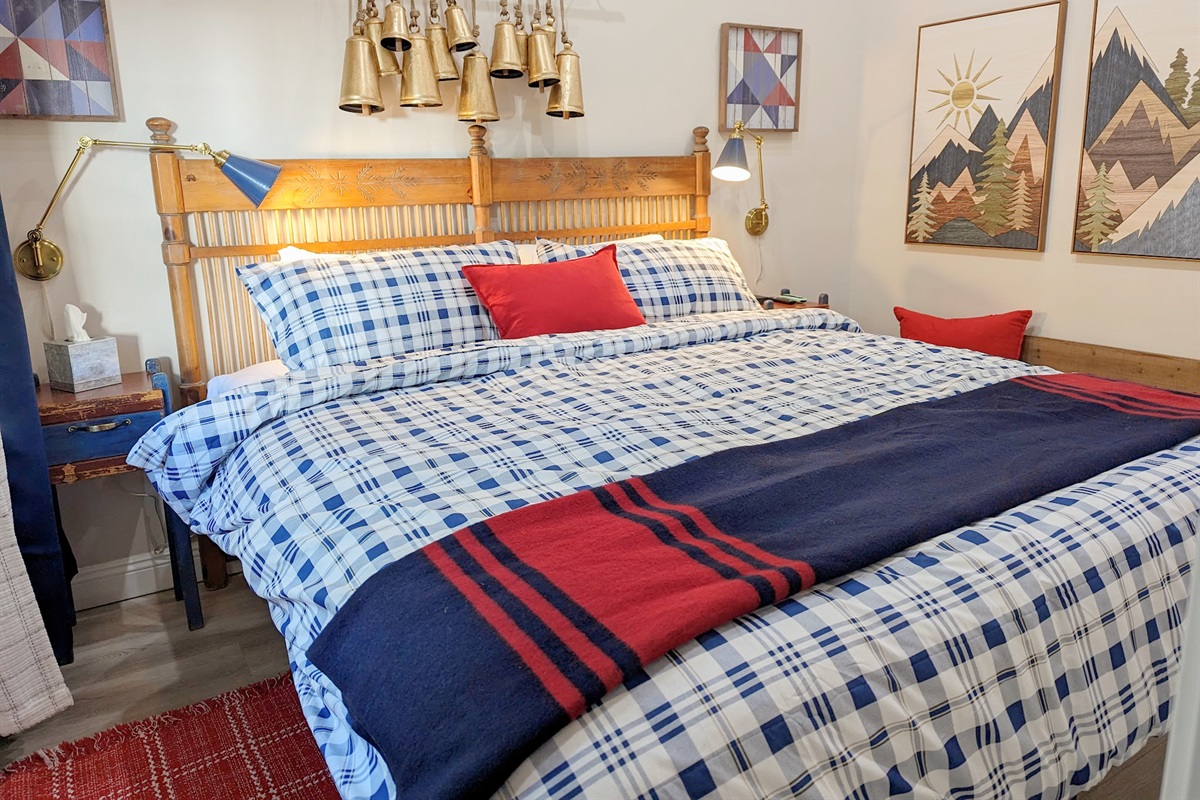 You will have a king size bed in it's own bedroom.  Equipped with cabin decor and smart tv, reading lamps, closet and small bench for luggage.