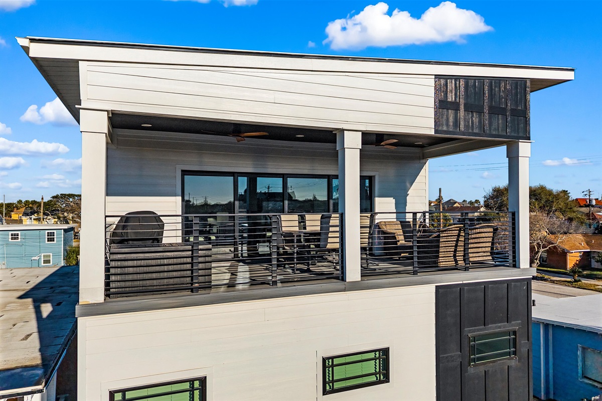 Rooftop Oasis: Enjoy vibrant sunsets and fresh sea breezes from this stylish retreat!