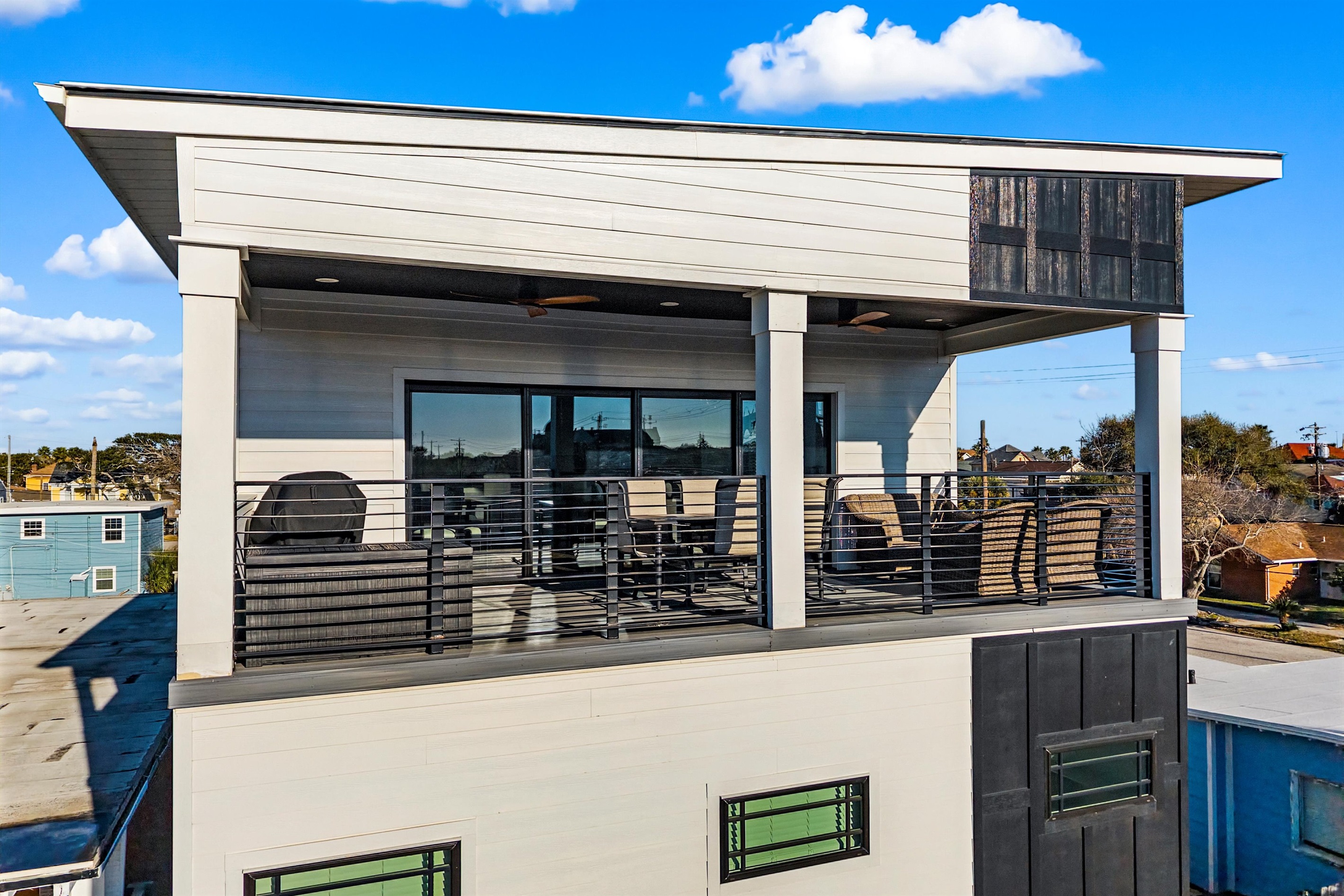 Rooftop Oasis: Enjoy vibrant sunsets and fresh sea breezes from this stylish retreat!