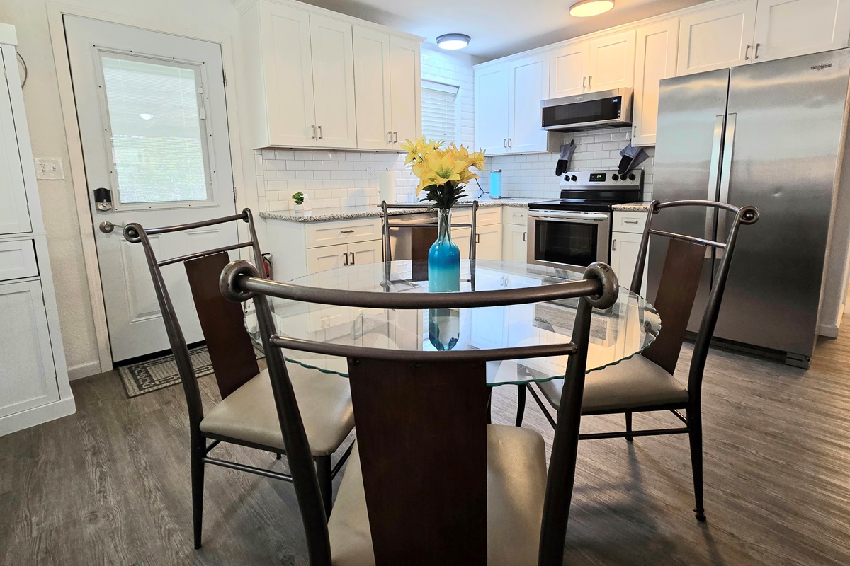 The kitchen is fully stocked with cooking & eating equipment, blender, crockpot, glass stop stove, dishwasher & large fridge. You'll have starter supplies of Keurig pods, sweetener, dishwasher soap, paper towel as well as cooking oil and some spices. 