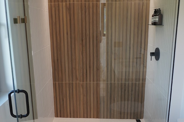 The primary bath features a large walk in shower.