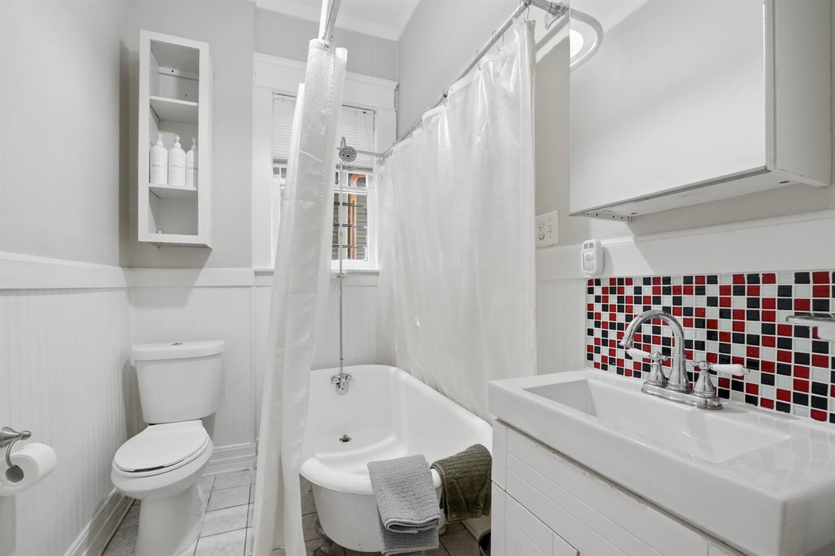 Full bathroom with bathtub and shower