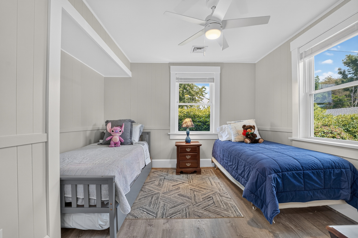Comfortable bedroom with two twin beds—perfect for children, friends, or additional guests.