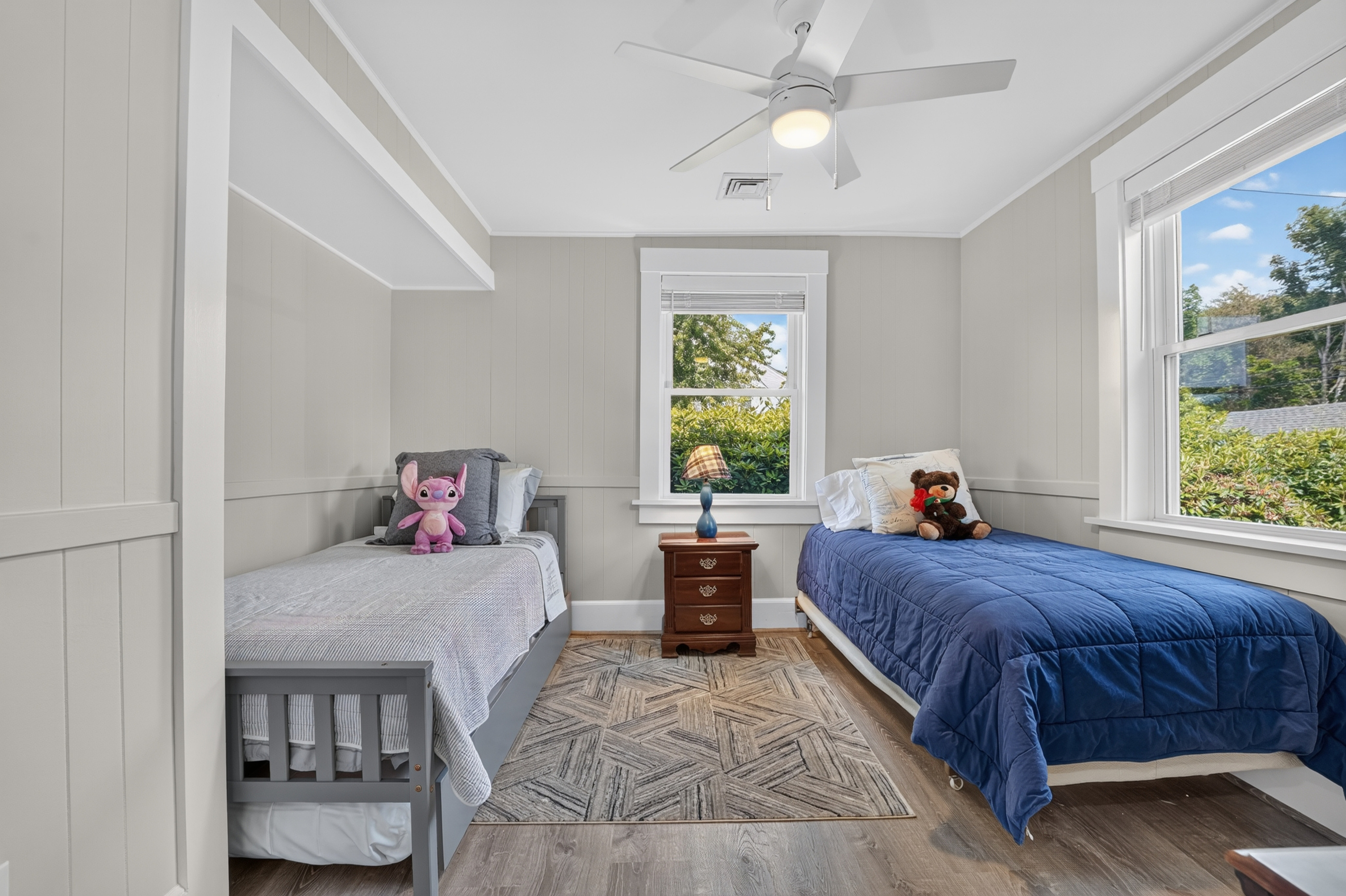 Comfortable bedroom with two twin beds—perfect for children, friends, or additional guests.