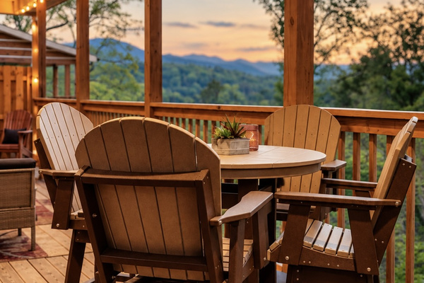 Share dinner at the high-top table as the peaks fade to blue at dusk.