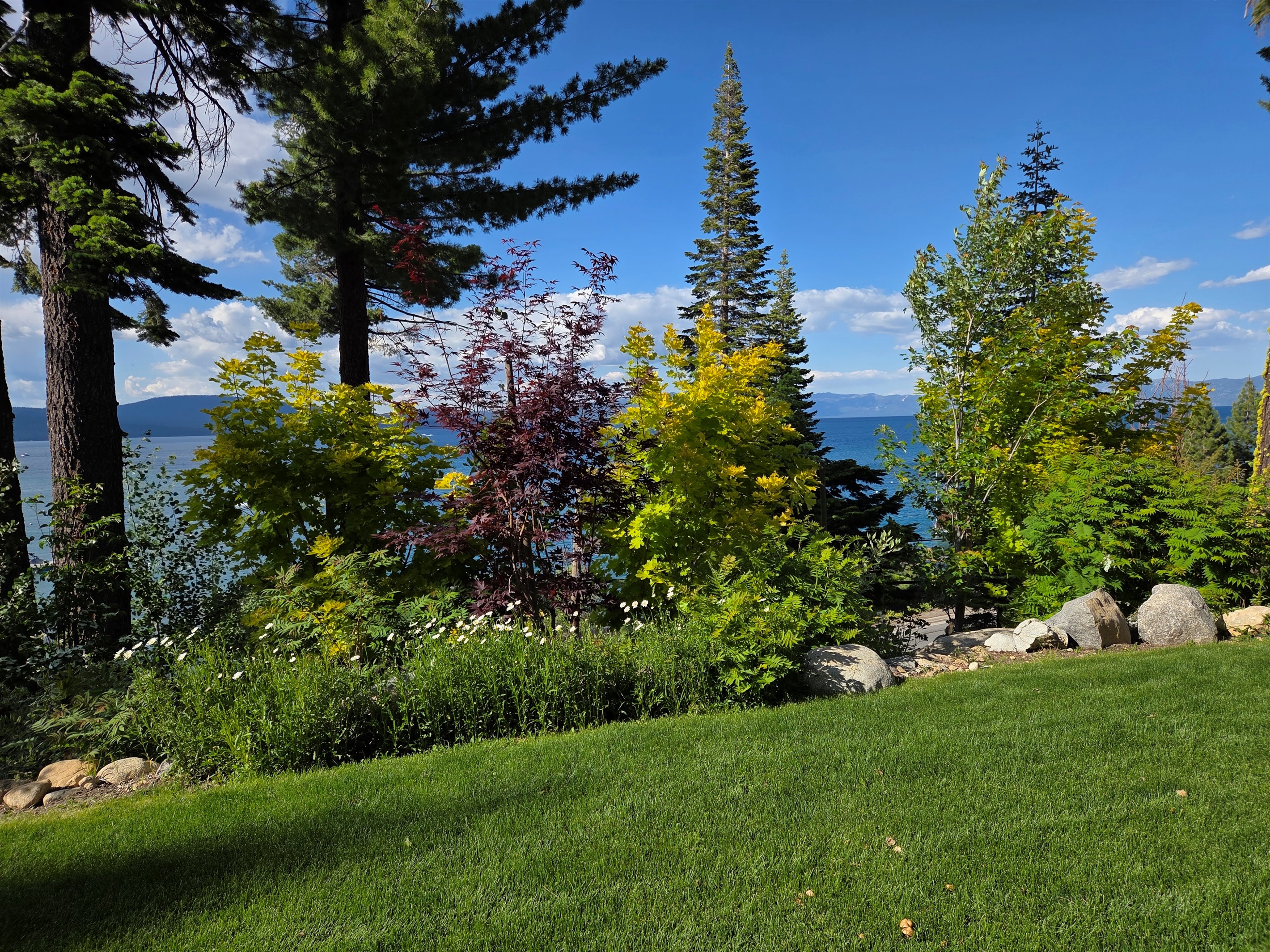 We've landscaping adds to the mountain feel and beautiful Lake Tahoe views.