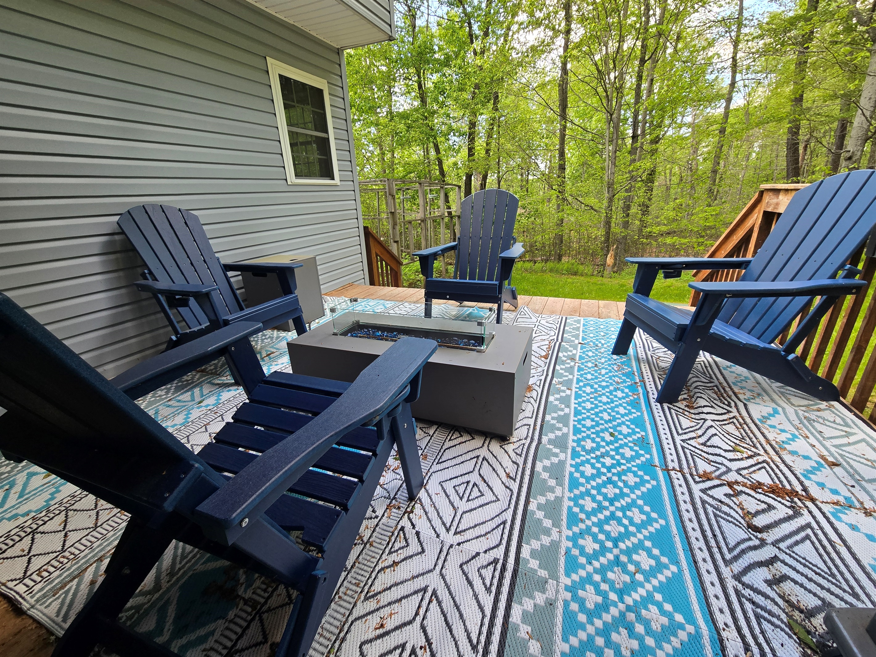 Rear deck with BBQ, propane fireplace and seating