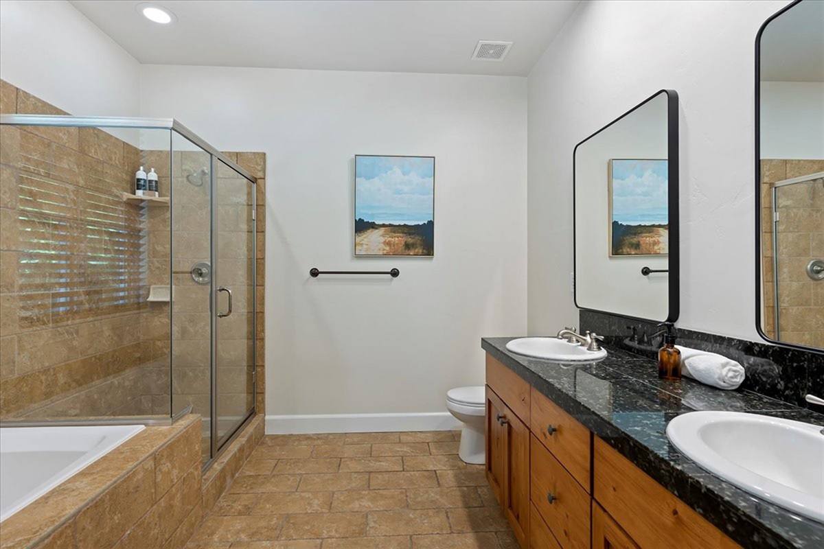 A clean, spacious bathroom designed for both function and a touch of everyday luxury.
