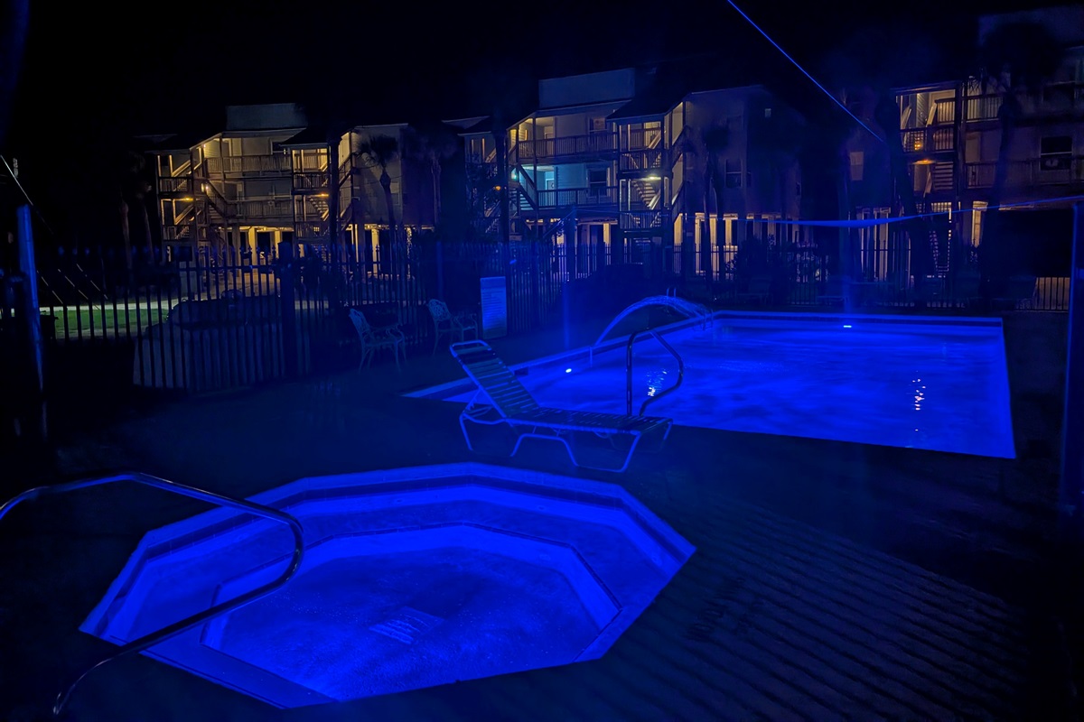 Night-time View of Pool and Hot Tub