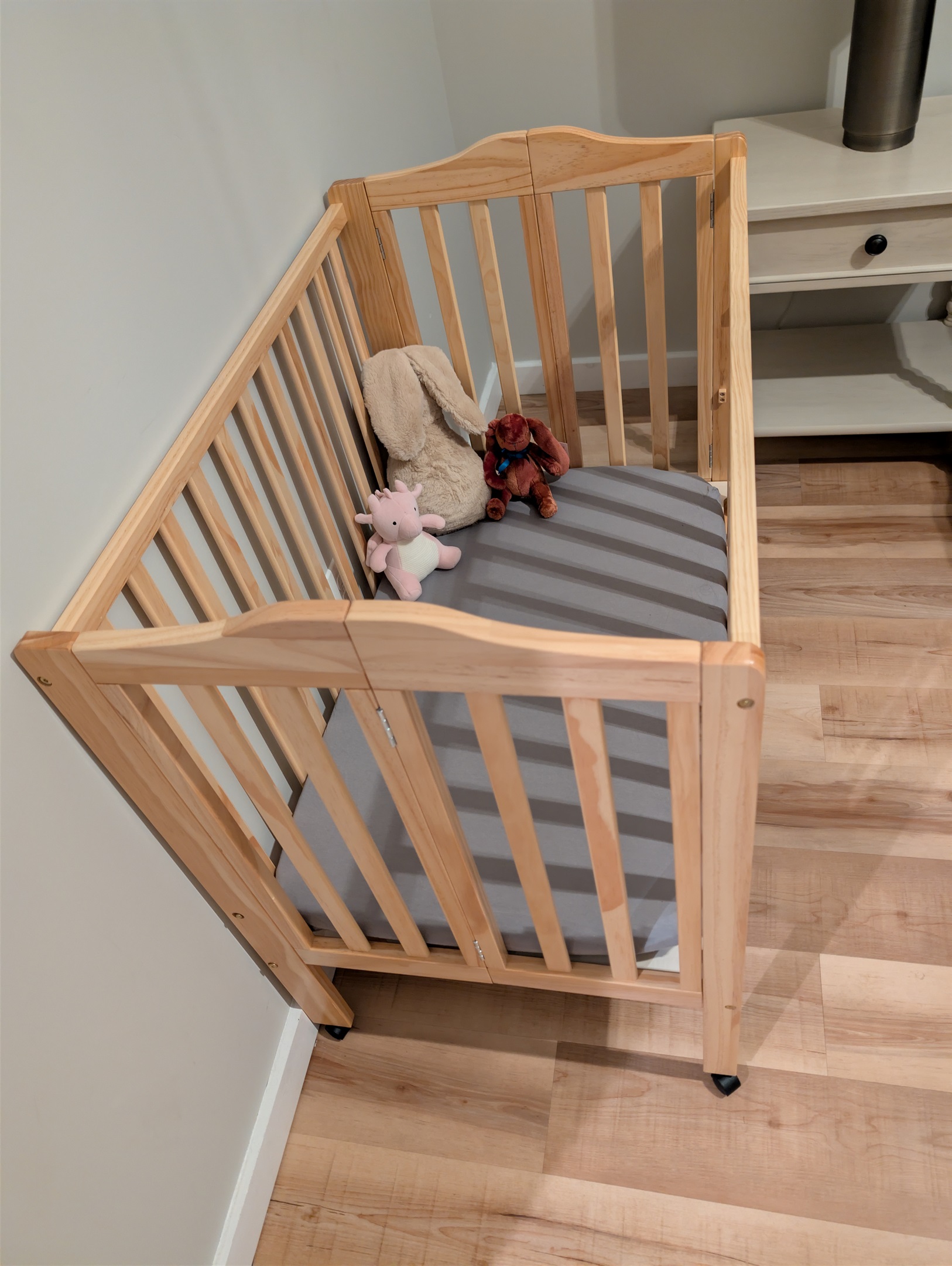 Safe and cozy crib provided for peaceful nap times for baby.
