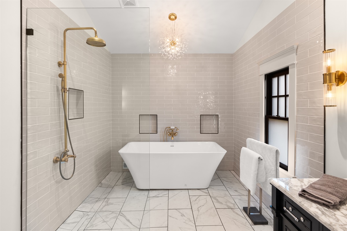 After walking around Broadway, soak your feet in our luxurious tub!