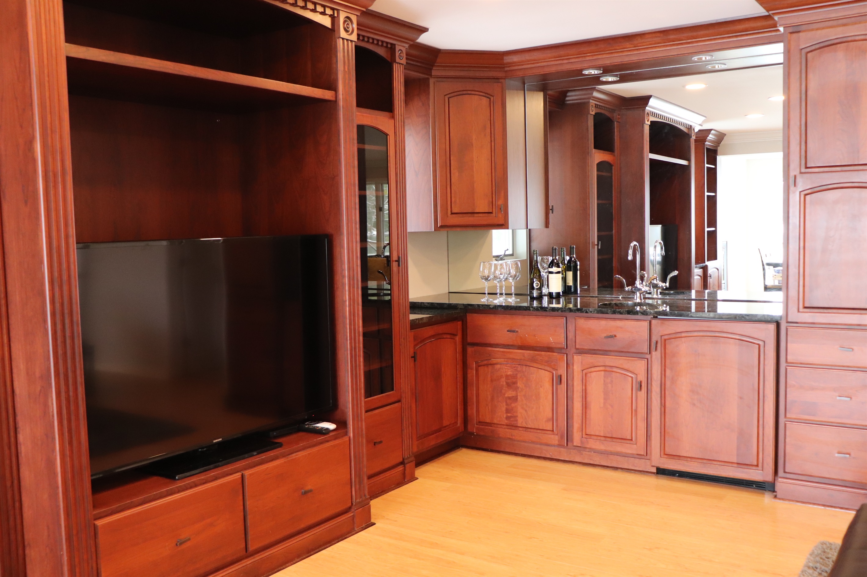 Custom built-ins including a wet bar.