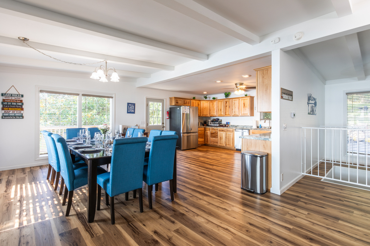 The open main level connects the dining area and fully equipped kitchen for easy group meals and gatherings.