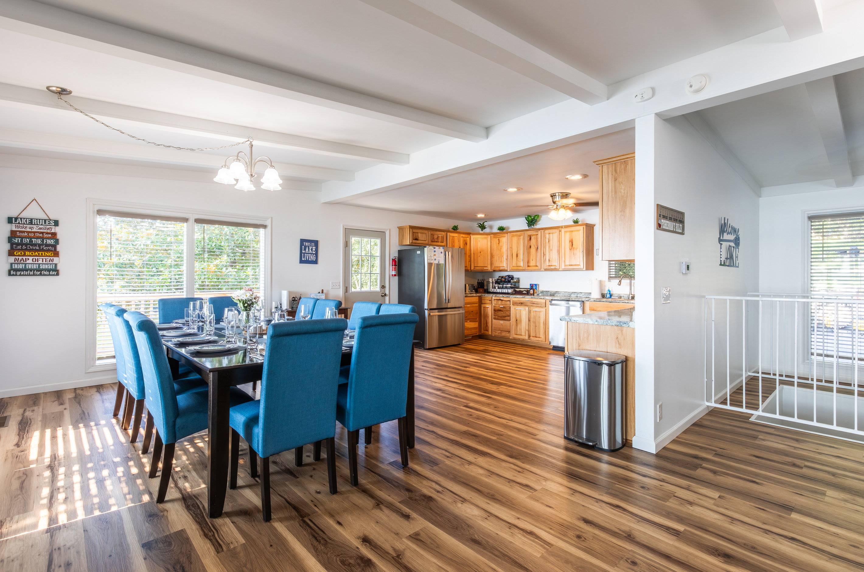 The open main level connects the dining area and fully equipped kitchen for easy group meals and gatherings.