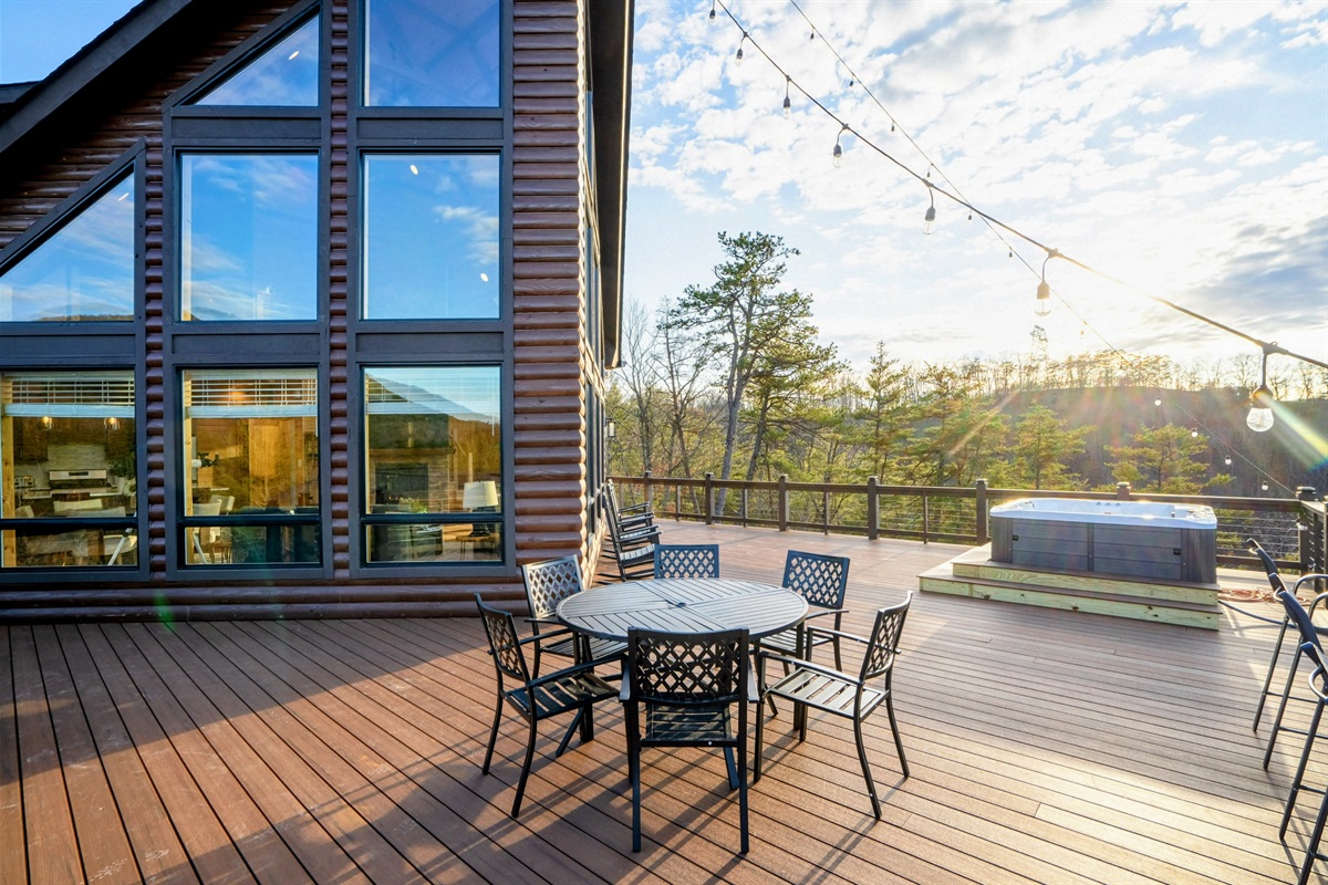 Al Fresco Dining – Share meals and laughter on the expansive deck, perfectly designed for outdoor living with panoramic scenery.
